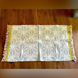 Trina Turk decorative accent rug great shape fringe